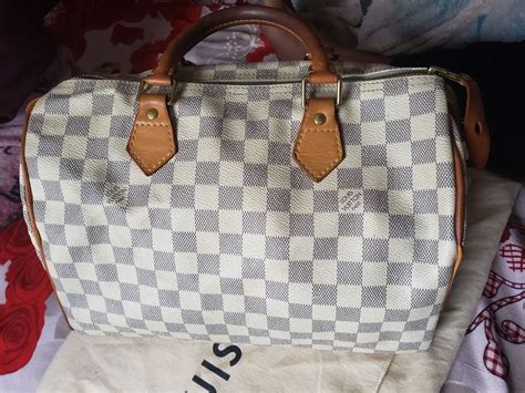 como saber si una bolsa louis vuitton es autentica